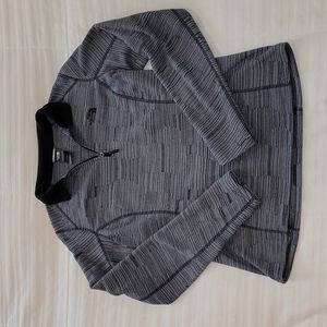 Women The North Face fleece partial- zipper pull-over.